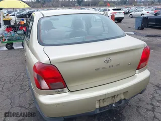 2001 Toyota ECHO with VIN JTDBT123610159121, listed as a IAAI auction lot 41766134 with 256,250 mi miles. Bid and sale history available at carsss.com. Image 6.