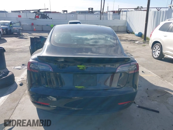 2019 Tesla Model 3 Mid Range with VIN 5YJ3E1EA0KF399082, listed as a IAAI auction lot 41697100 with 138,998 mi miles and . Bid and sale history available at carsss.com. Image 16.