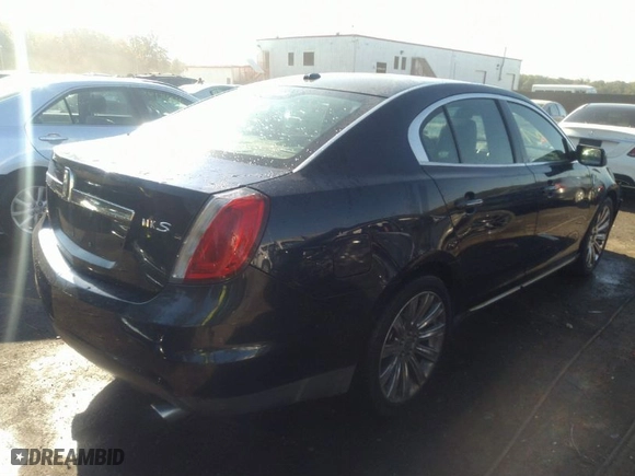 2009 Lincoln MKS with VIN 1LNHM93R99G634929, listed as a IAAI auction lot 34658773 with 70639 miles. Bid and sale history available at carsss.com. Image 4.