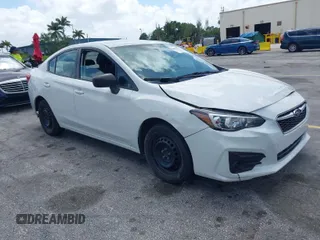 2018 Subaru Impreza with VIN 4S3GKAA68J3609404, listed as a IAAI auction lot 41954733 with 214,560 mi miles. Bid and sale history available at carsss.com. Image 1.