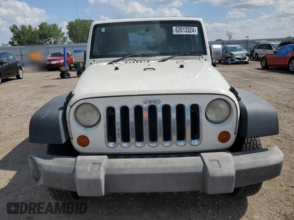 2008 Jeep Wrangler X с VIN 1J4FZ24188L503312, выставлен на аукционе Copart как лот 62013324 с пробегом 174 344 миль миль и Списание • Salvage title. История ставок и продаж доступна на DreamBid. Изображение 5.