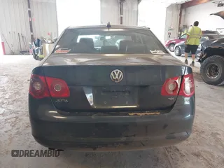 2006 Volkswagen Jetta 1.9L TDI z VIN 3VWDT71K26M624953, wystawiony jako IAAI lot #42420386 z przebiegiem 161 686 mil mil oraz . Historia ofert i sprzedaży dostępna na DreamBid. Obrazek 16.