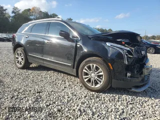 2023 Cadillac XT5 AWD Premium Luxury with VIN 1GYKNDRS7PZ105706, listed as a Copart auction lot 80413084 with 64,508 mi miles and Salvage Title. Bid and sale history available at DreamBid. Image 4.