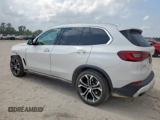 2021 BMW X5 sDrive40i with VIN 5UXCR4C06M9F56578, listed as a Copart auction lot 58218315 with 69,927 mi miles and Salvage title. Bid and sale history available at DreamBid. Image 2.