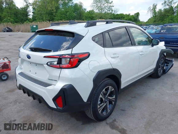 2024 Subaru Crosstrek Premium with VIN JF2GUADC2R8913808, listed as a IAAI auction lot 42171997 with 1,219 mi miles and . Bid and sale history available at DreamBid. Image 4.