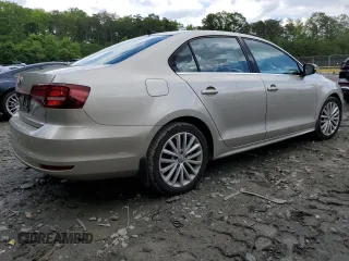 2016 Volkswagen Jetta SEL z VIN 3VWL17AJ3GM205357, wystawiony jako Copart lot #59086395 z przebiegiem 104 939 mil mil oraz Szkoda całkowita • Salvage title. Historia ofert i sprzedaży dostępna na DreamBid. Obrazek 3.