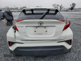 2020 Toyota C-HR LE z VIN JTNKHMBX1L1092846, wystawiony jako Copart lot #53056325 z przebiegiem 32 875 mil mil oraz Tytuł czysty. Historia ofert i sprzedaży dostępna na DreamBid. Obrazek 6.