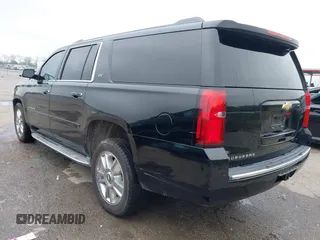 2015 Chevrolet Suburban LTZ with VIN 1GNSCKKC6FR271675, listed as a IAAI auction lot 41915036 with 150,917 mi miles. Bid and sale history available at carsss.com. Image 3.