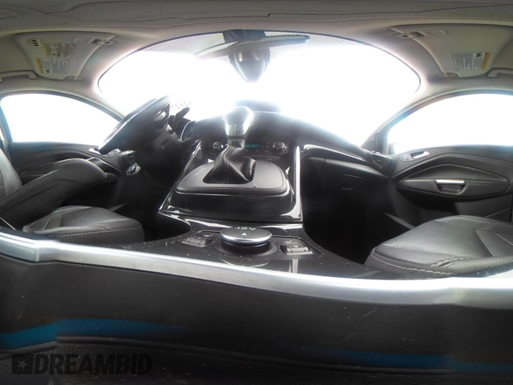 2014 Ford Escape Titanium with VIN 1FMCU9J9XEUD71715, listed as a IAAI auction lot 42127982 with 96,549 mi miles and . Bid and sale history available at DreamBid. Image 18.