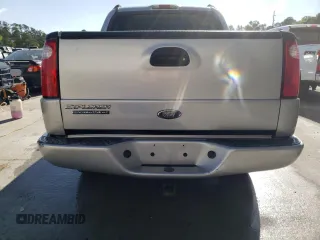 2004 Ford Explorer Sport Trac XLS with VIN 1FMZU67K24UB65144, listed as a Copart auction lot 52611305 with 211,806 mi miles and Salvage title. Bid and sale history available at DreamBid. Image 6.