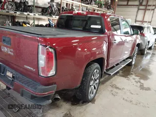2020 GMC Canyon 4WD Denali with VIN 1GTG6EEN3L1152125, listed as a IAAI auction lot 41179798 with 26,882 mi miles. Bid and sale history available at carsss.com. Image 4.