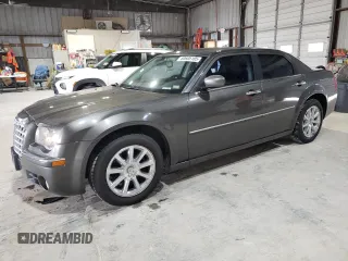 2008 Chrysler 300 Limited with VIN 2C3KA33GX8H126264, listed as a Copart auction lot 60605105 with 143,765 mi miles and Salvage title. Bid and sale history available at DreamBid. Image 1.