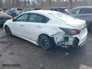 2018 Nissan Altima 2.5 SV with VIN 1N4AL3AP5JC170904, listed as a IAAI auction lot 41621502 with 115,674 mi miles. Bid and sale history available at carsss.com. Image 3.