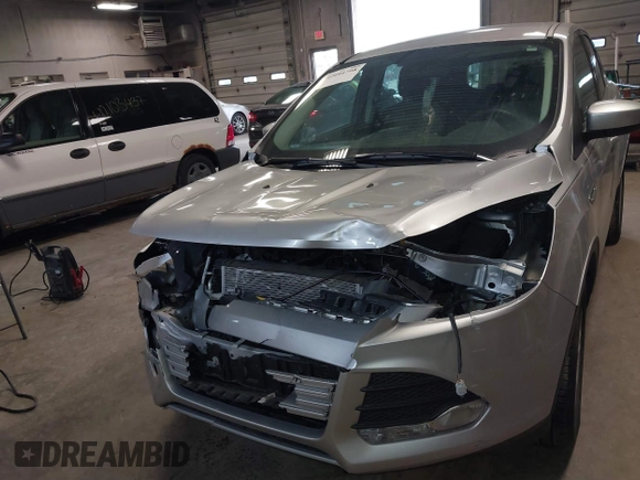 2015 Ford Escape SE with VIN 1FMCU0GX4FUC22042, listed as a IAAI auction lot 42094798 with 35,407 mi miles and . Bid and sale history available at DreamBid. Image 13.
