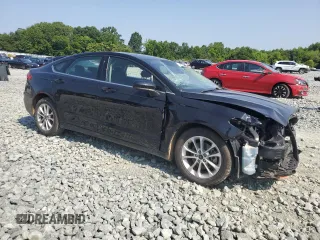 2020 Ford Fusion SE with VIN 3FA6P0HD4LR122075, listed as a Copart auction lot 59009485 with 143,247 mi miles and Salvage title. Bid and sale history available at DreamBid. Image 4.