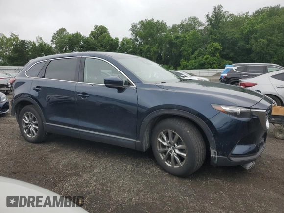 2018 Mazda CX-9 Touring with VIN JM3TCBCY8J0225549, listed as a Copart auction lot 61172975 with 89,969 mi miles and Salvage title. Bid and sale history available at DreamBid. Image 4.