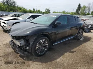 2024 Kia EV6 Wind z VIN KNDC3DLC6R5617288, wystawiony jako Copart lot #60089275 z przebiegiem 54 419 mil mil oraz Szkoda całkowita • Salvage title. Historia ofert i sprzedaży dostępna na DreamBid. Obrazek 1.