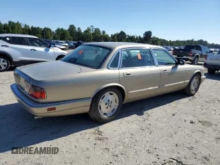 1997 Jaguar XJ with VIN SAJHX6241VC795259, listed as a Copart auction lot 70752854 with Not provided miles and Salvage title. Bid and sale history available at DreamBid. Image 3.