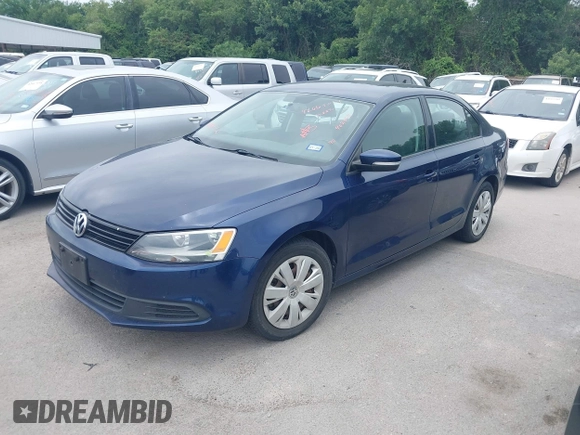 2014 Volkswagen Jetta SE z VIN 3VWD17AJ0EM402858, wystawiony jako IAAI lot #42663051 z przebiegiem 138 606 mil mil oraz . Historia ofert i sprzedaży dostępna na DreamBid. Obrazek 2.