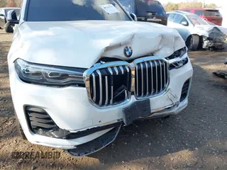 2019 BMW X7 xDrive50i z VIN 5UXCX4C59KLS38761, wystawiony jako IAAI lot #40743791 z przebiegiem Nie podano mil oraz . Historia ofert i sprzedaży dostępna na DreamBid. Obrazek 6.