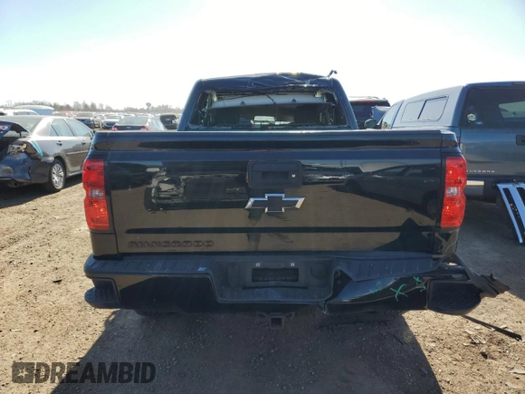 2017 Chevrolet Silverado 1500 LT with VIN 1GCVKREC6HZ345662, listed as a Copart auction lot 53331815 with 121,081 mi miles and Salvage Title. Bid and sale history available at DreamBid. Image 6.