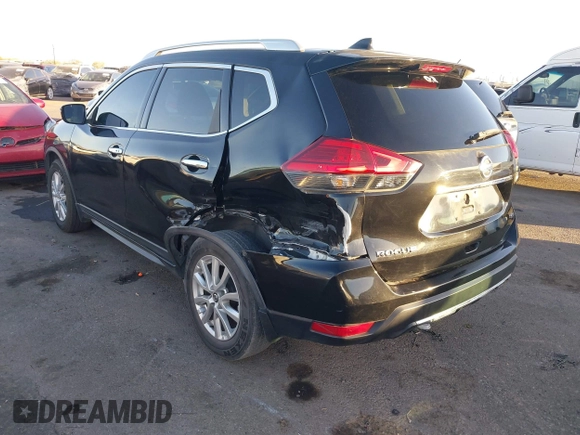 2017 Nissan Rogue S with VIN KNMAT2MT1HP588697, listed as a IAAI auction lot 41146939 with 88,704 mi miles and . Bid and sale history available at DreamBid. Image 3.