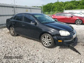 2009 Volkswagen Jetta S z VIN 3VWJM71K39M165677, wystawiony jako Copart lot #56901665 z przebiegiem 202 632 mil mil oraz Czysty tytuł • Clean title. Historia ofert i sprzedaży dostępna na DreamBid. Obrazek 4.