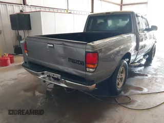 2000 Mazda B-Series 2WD Truck DS with VIN 4F4YR16V8YTM09723, listed as a IAAI auction lot 41365401 with 170,351 mi miles. Bid and sale history available at carsss.com. Image 4.