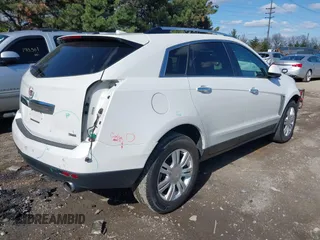 2014 Cadillac SRX Luxury Collection with VIN 3GYFNBE35ES581743, listed as a IAAI auction lot 41995293 with 140,987 mi miles. Bid and sale history available at carsss.com. Image 4.