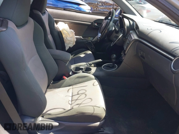2014 Scion tC with VIN JTKJF5C70E3083839, listed as a IAAI auction lot 41886711 with 118,029 mi miles. Bid and sale history available at carsss.com. Image 5.