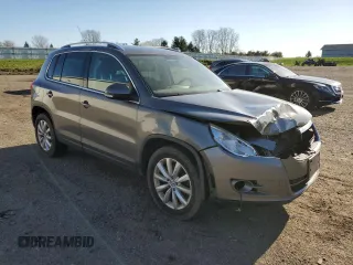 2011 Volkswagen Tiguan SE with VIN WVGBV7AX6BW525171, listed as a Copart auction lot 53643265 with 208,206 mi miles and Clean Title. Bid and sale history available at DreamBid. Image 4.