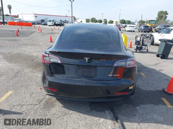 2022 Tesla Model 3 Long Range with VIN 5YJ3E1EB6NF233131, listed as a IAAI auction lot 41819409 with 38,308 mi miles and . Bid and sale history available at DreamBid. Image 15.