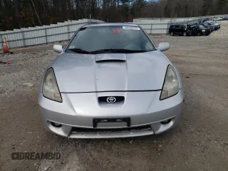 2001 Toyota Celica GT z VIN JTDDR32T910100289, wystawiony jako Copart lot #49600415 z przebiegiem 227 862 mil mil oraz Czysty tytuł • Clean title. Historia ofert i sprzedaży dostępna na DreamBid. Obrazek 5.