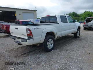 2013 Toyota Tacoma PreRunner z VIN 5TFKU4HN6DX003129, wystawiony jako IAAI lot #42190939 z przebiegiem 206 404 mil mil oraz . Historia ofert i sprzedaży dostępna na DreamBid. Obrazek 4.
