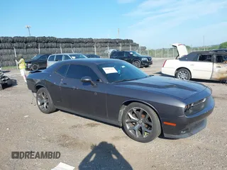 2015 Dodge Challenger SXT Plus with VIN 2C3CDZBG4FH705568, listed as a IAAI auction lot 42603147 with 107,560 mi miles and . Bid and sale history available at DreamBid. Image 1.