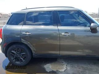 2014 MINI Countryman S with VIN WMWZC3C59EWP29137, listed as a IAAI auction lot 42661922 with 128,064 mi miles and . Bid and sale history available at DreamBid. Image 13.