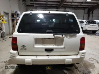 1998 Jeep Grand Cherokee Laredo with VIN 1J4GZ48SXWC183782, listed as a Copart auction lot 41700675 with 226,544 mi miles and Salvage Title. Bid and sale history available at carsss.com. Image 6.