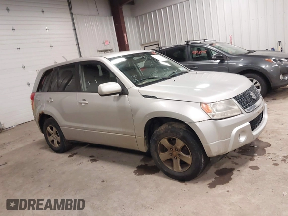 2012 Suzuki Grand Vitara Premium z VIN JS3TD0D62C4100440, wystawiony jako IAAI lot #41711815 z przebiegiem 171 527 mil mil oraz . Historia ofert i sprzedaży dostępna na DreamBid. Obrazek 13.