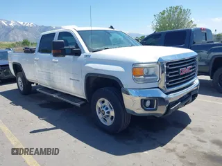 2016 GMC Sierra 2500HD SLE z VIN 1GT12SEG9GF180988, wystawiony jako IAAI lot #42321220 z przebiegiem 195 188 mil mil oraz . Historia ofert i sprzedaży dostępna na DreamBid. Obrazek 1.