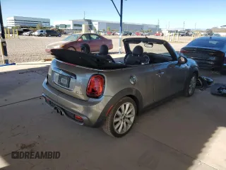 2019 MINI Convertible Cooper S с VIN WMWWG9C54K3E40225, выставлен на аукционе Copart как лот 42201665 с пробегом 56 749 миль миль и Списание • Salvage title. История ставок и продаж доступна на DreamBid. Изображение 3.