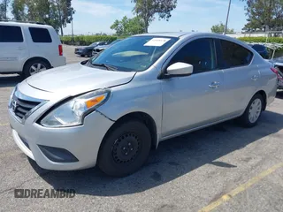 2015 Nissan Versa SV with VIN 3N1CN7AP1FL846929, listed as a IAAI auction lot 42068428 with 104,773 mi miles. Bid and sale history available at carsss.com. Image 2.