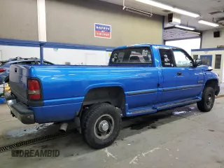 1999 Dodge Ram 2500 with VIN 1B7KF2363XJ608134, listed as a Copart auction lot 85928784 with 199,243 mi miles and Salvage Title. Bid and sale history available at carsss.com. Image 3.