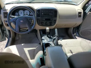 2006 Ford Escape XLS z VIN 1FMYU02Z36KB10195, wystawiony jako Copart lot #53108415 z przebiegiem Nie podano mil oraz Szkoda całkowita • Salvage title. Historia ofert i sprzedaży dostępna na DreamBid. Obrazek 8.