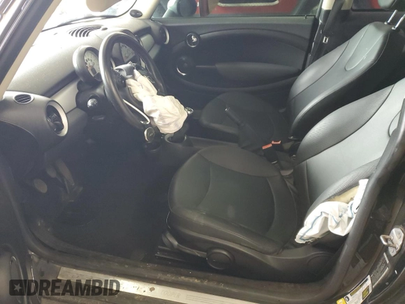 2011 MINI Hardtop with VIN WMWSU3C59BT099759, listed as a Copart auction lot 53995355 with 141,575 mi miles and Salvage Title. Bid and sale history available at DreamBid. Image 7.