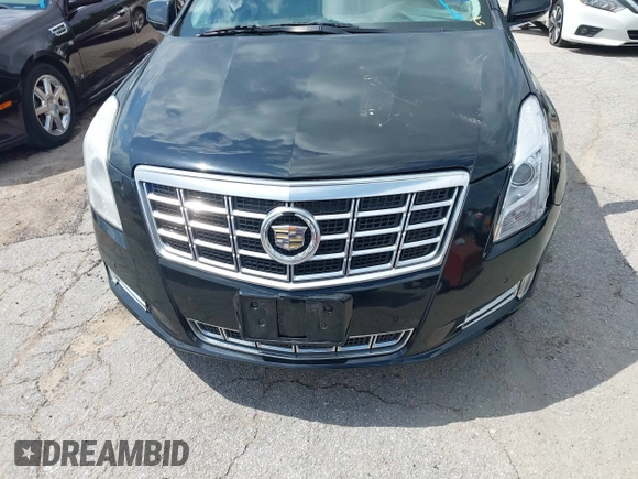 2013 Cadillac XTS Premium with VIN 2G61S5S39D9144177, listed as a IAAI auction lot 42111910 with 69,830 mi miles. Bid and sale history available at carsss.com. Image 12.