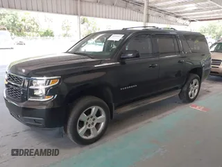 2015 Chevrolet Suburban LT with VIN 1GNSKJKC7FR199544, listed as a IAAI auction lot 42169017 with 219,219 mi miles and . Bid and sale history available at DreamBid. Image 17.