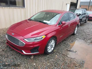 2019 Ford Fusion Hybrid SEL with VIN 3FA6P0MU6KR136726, listed as a IAAI auction lot 41071389 with 103,759 mi miles. Bid and sale history available at carsss.com. Image 17.