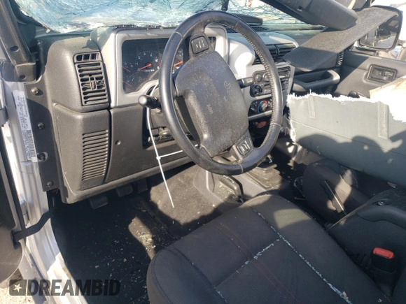 2003 Jeep Wrangler Rubicon z VIN 1J4FA69S53P375189, wystawiony jako Copart lot #54292035 z przebiegiem 55 863 mil mil oraz Szkoda całkowita • Salvage title. Historia ofert i sprzedaży dostępna na DreamBid. Obrazek 8.
