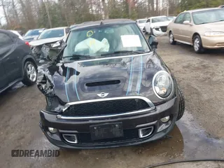 2013 MINI Convertible S with VIN WMWZP3C54DT297304, listed as a IAAI auction lot 41377572 with 101,991 mi miles and . Bid and sale history available at DreamBid. Image 12.