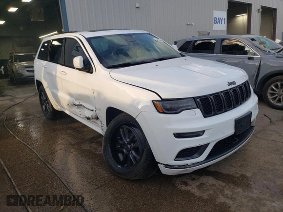 2019 Jeep Grand Cherokee Overland with VIN 1C4RJFCT7KC539942, listed as a Copart auction lot 78011204 with 101,450 mi miles and Salvage Title. Bid and sale history available at carsss.com. Image 4.